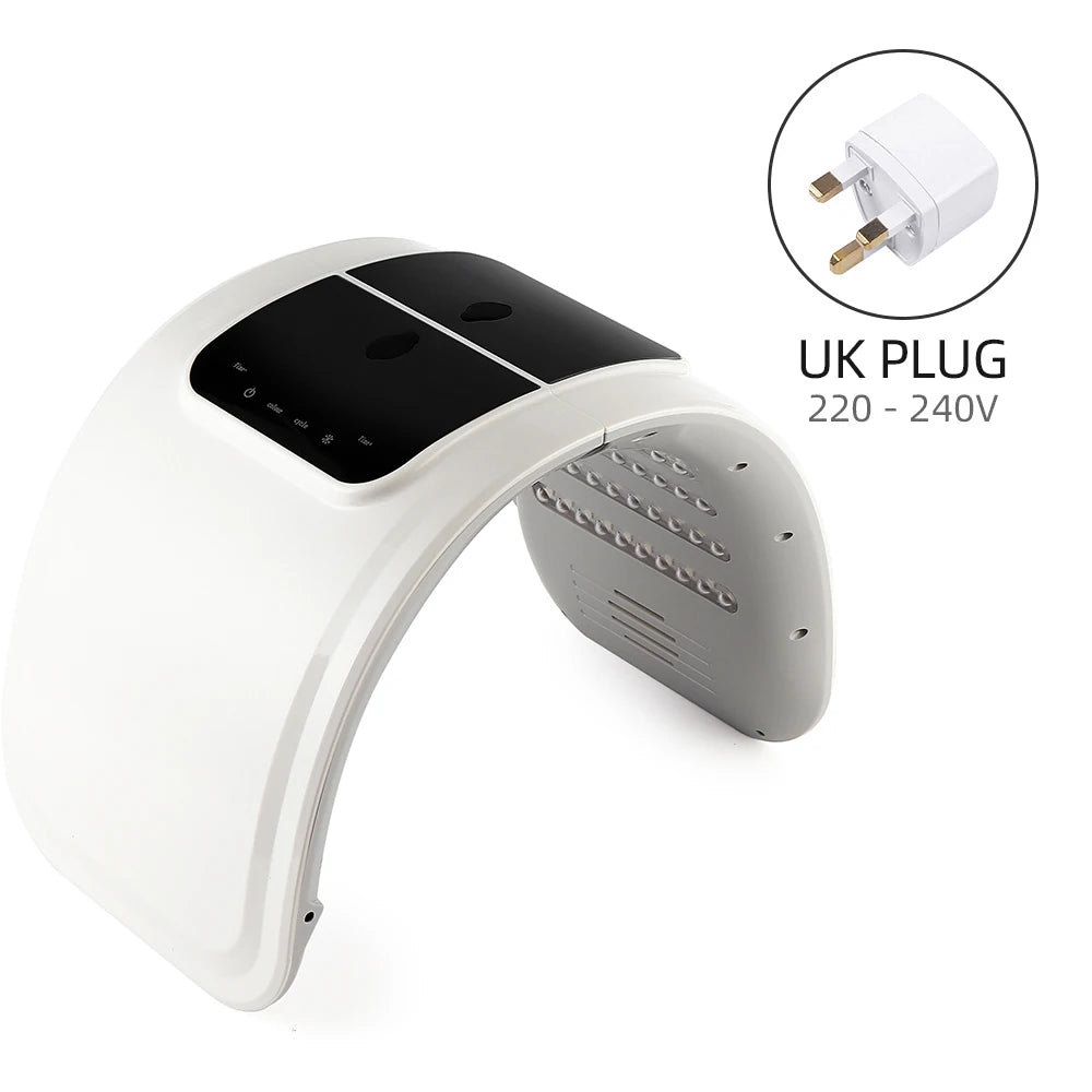 White arched LED light therapy facial mask with black control panel and included UK power adapter.