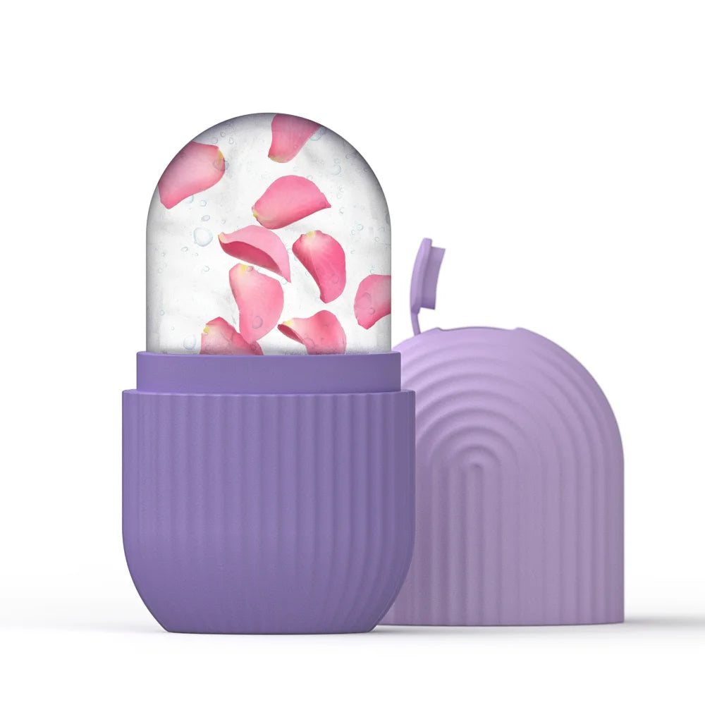 Purple silicone ice roller mold with a frozen ice dome containing floating pink rose petals and its matching cap.