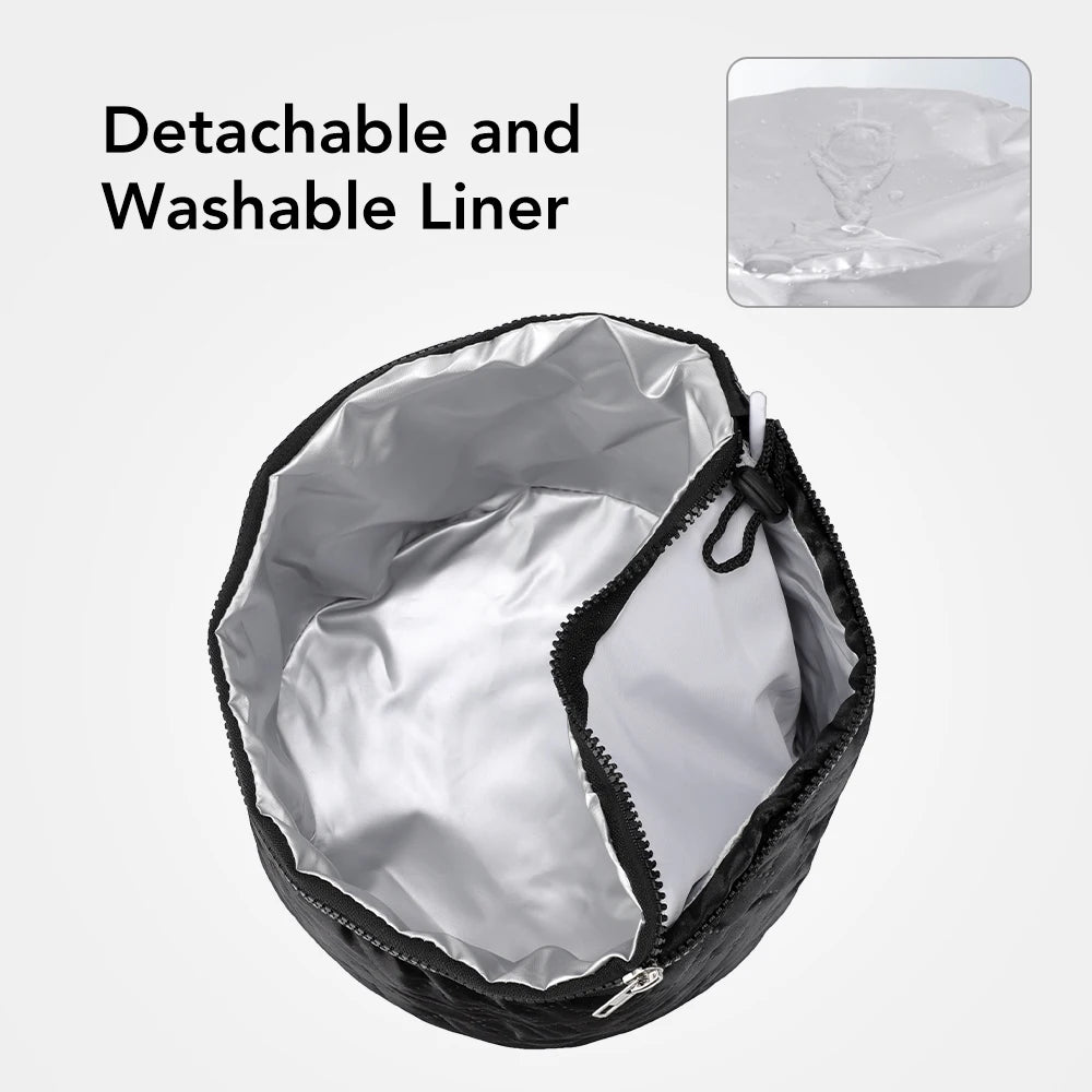 Black electric hair thermal treatment cap with detachable, washable silver waterproof liner for salon spa hair care.