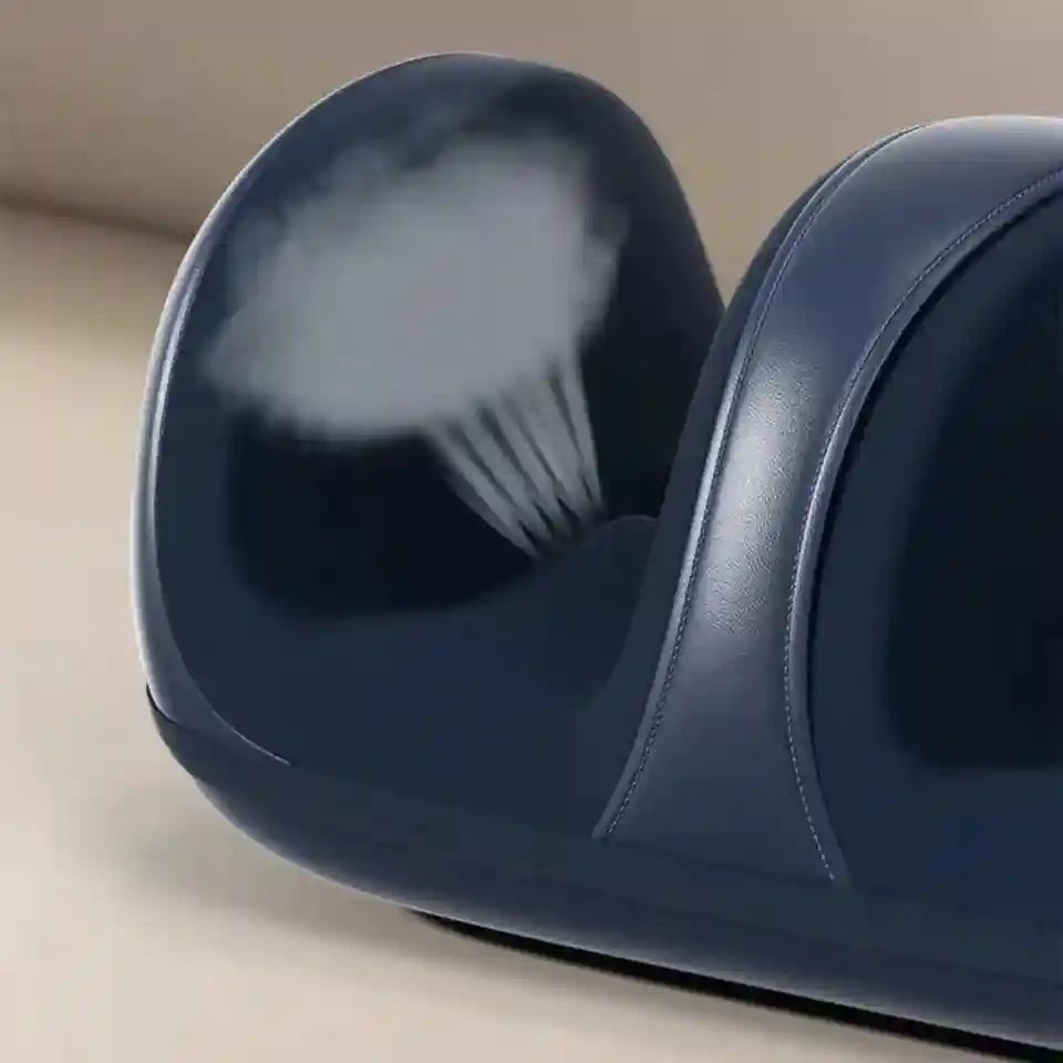 Dark blue electric foot and leg massager with heated steam function for deep tissue kneading and stress relief.
