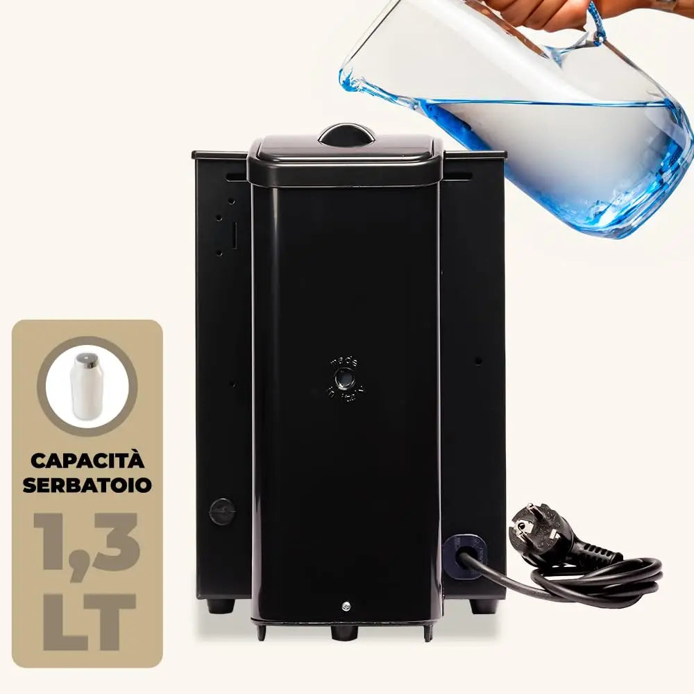 Black 1.3L coffee machine being filled with water. Compact, modern Italian-made design for easy home brewing.
