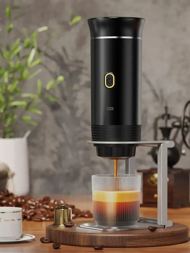 Tidesmit 3-in-1 portable espresso machine for car and camping showing power button and capsule chamber side view