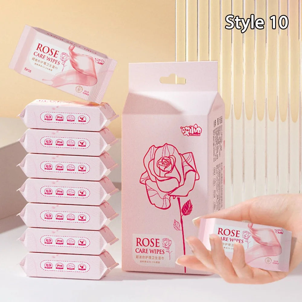 Rose Care baby wipes, 8-count travel packs, pink floral design, gentle pH-balanced baby care cleansing wipes.