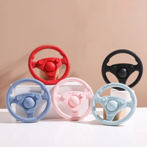 Multi-colored silicone steering wheel baby teething toys for soothing relief.