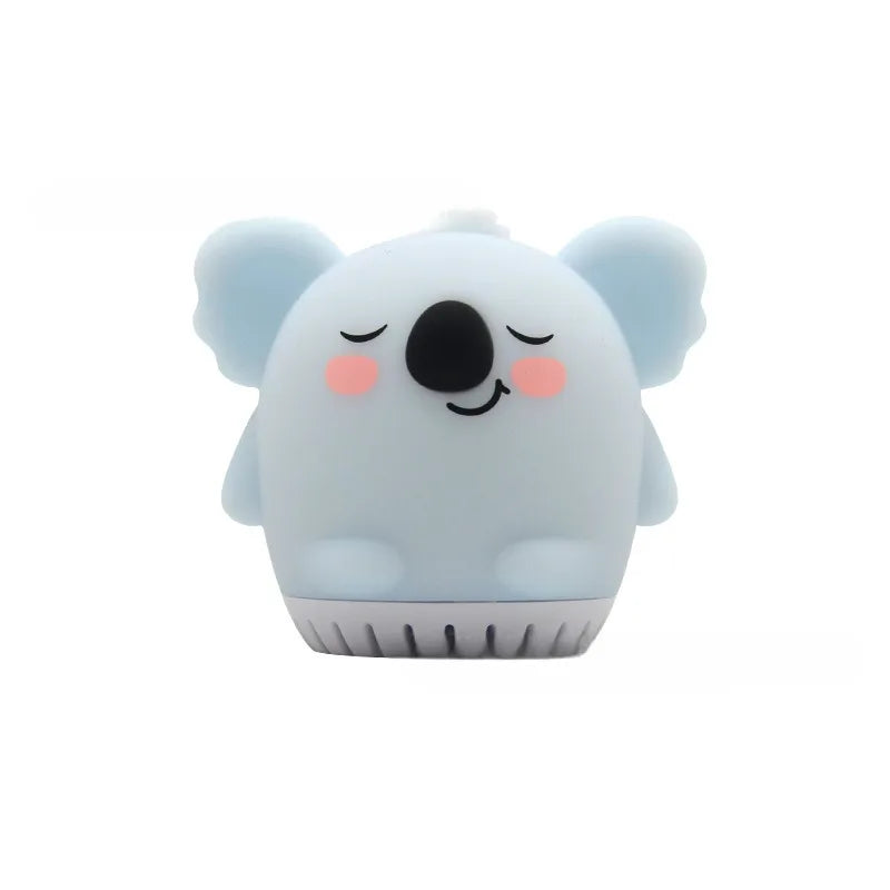 Blue koala sound machine for sleep aid with white base control button, isolated on white background.