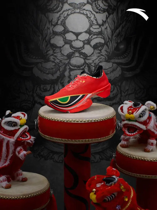 ANTA C10 Pro 2.0 red Xingshi carbon plate running sneakers featuring a vibrant mesh upper and bold geometric patterns.