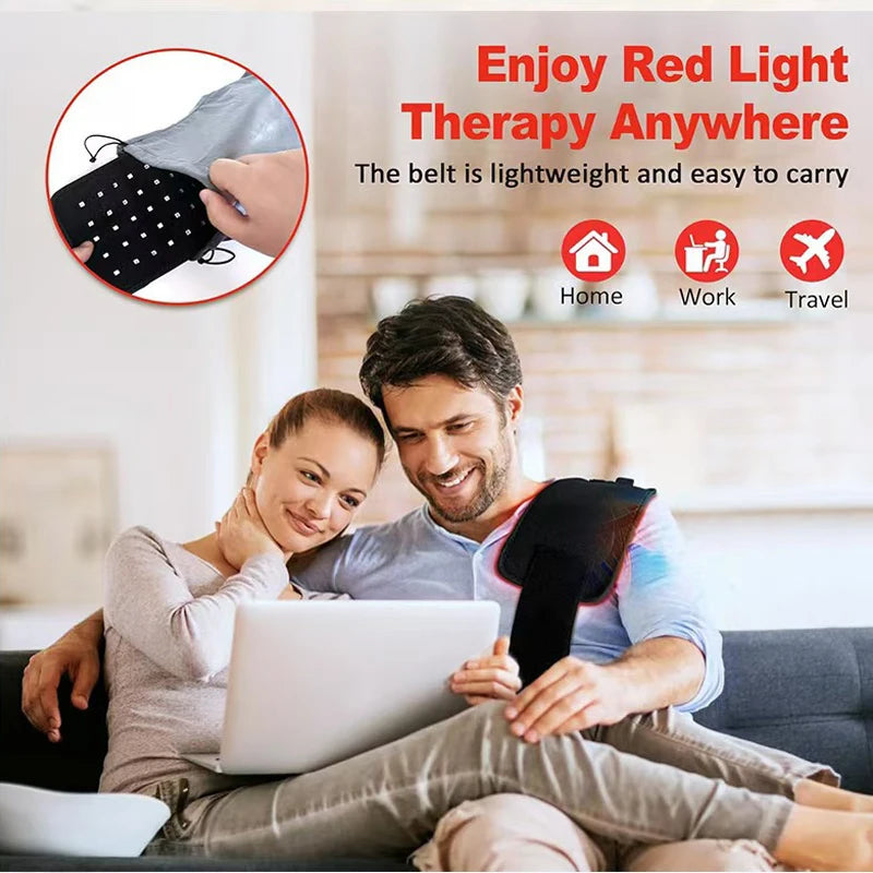 Portable red light therapy belt for back and waist with 660nm and 850nm LED lights being worn by a man on a sofa.