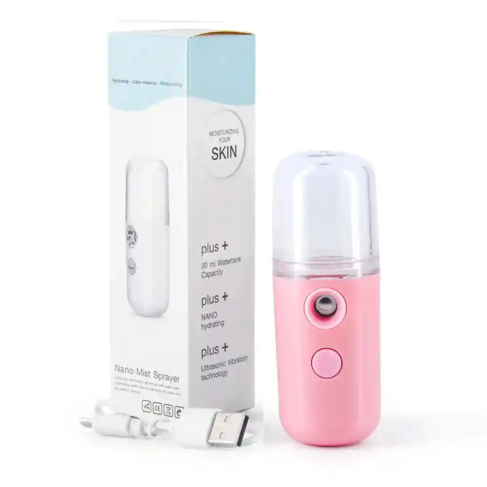 Portable pink nano facial mister sprayer for hydrating skin, eyelash extensions, and makeup with USB charging cable.