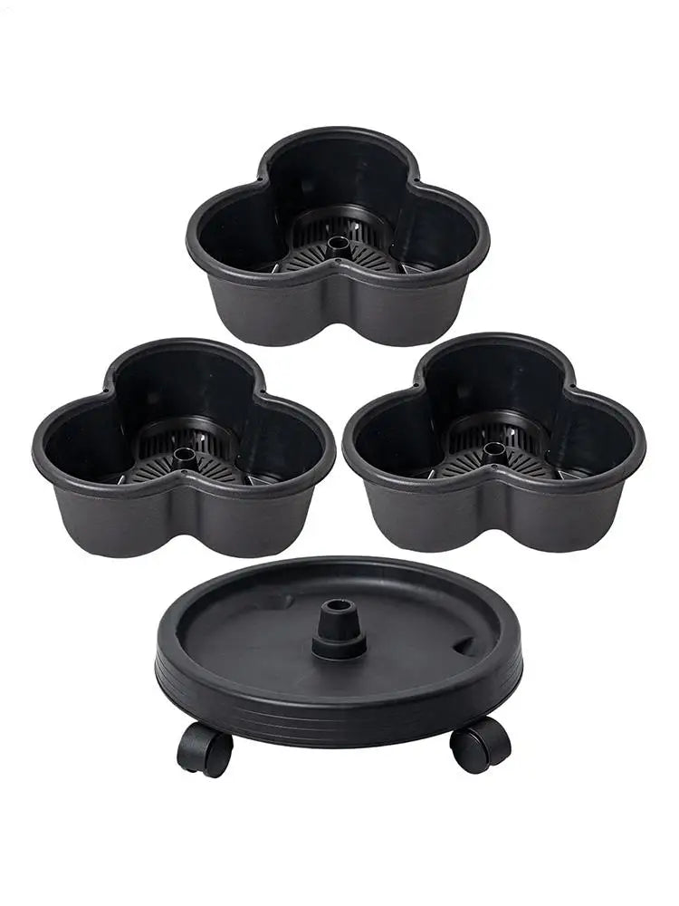 Three dark flower-shaped planter cups with center drain and a round lidded base