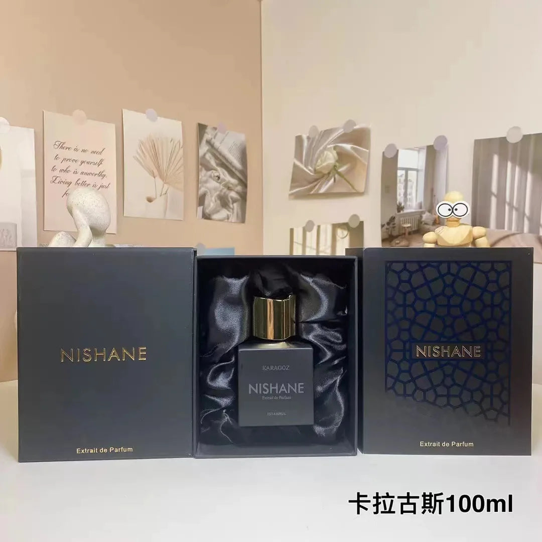 Nishane Karagoz Extrait de Parfum 100ml for men: sleek black square bottle with gold cap in a premium gift box.