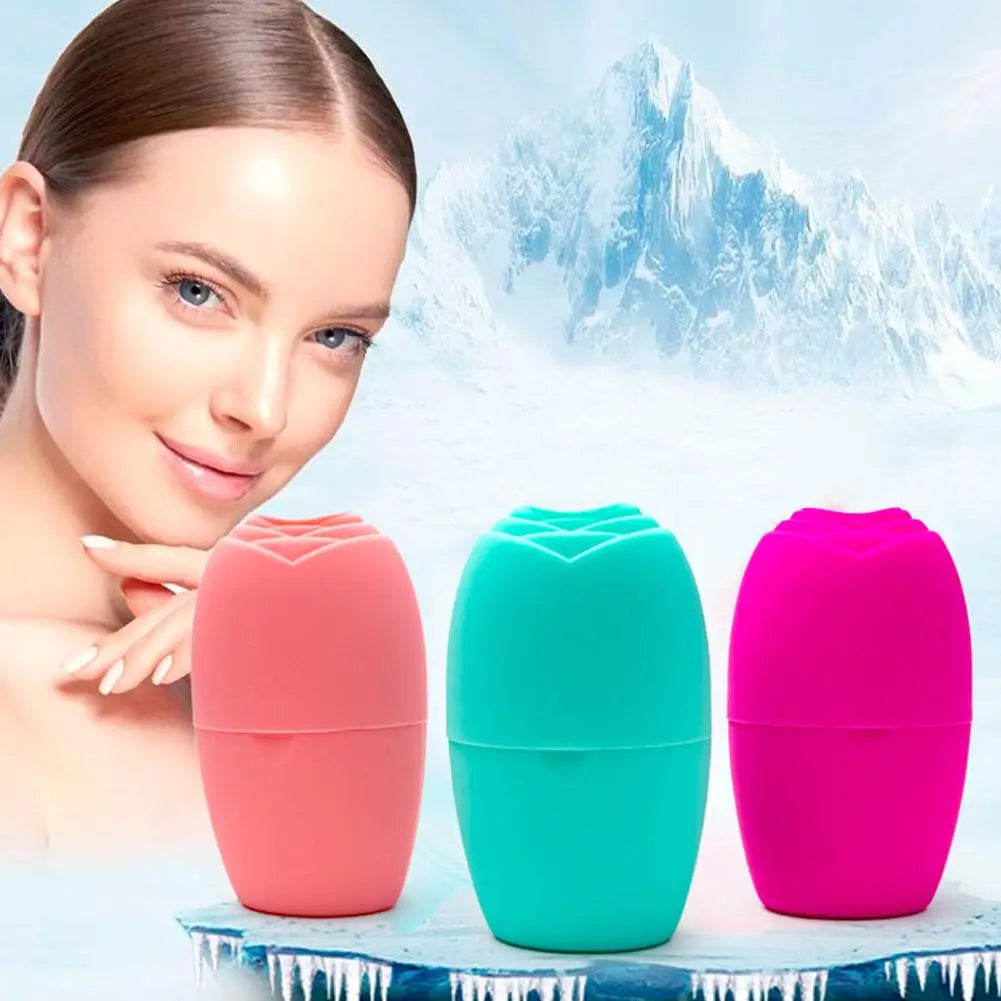 Three rose-shaped silicone ice molds in pink, teal, and magenta against a snowy mountain background.