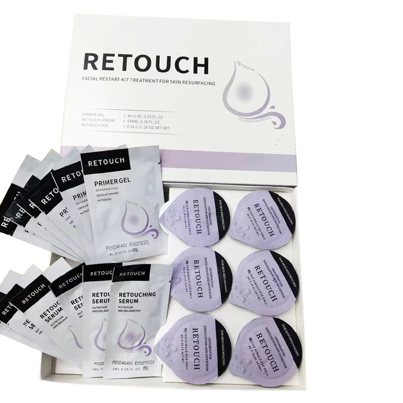 Retouch facial kit in a white box, including silver sachets of primer gel and serum, and six purple individual pods.