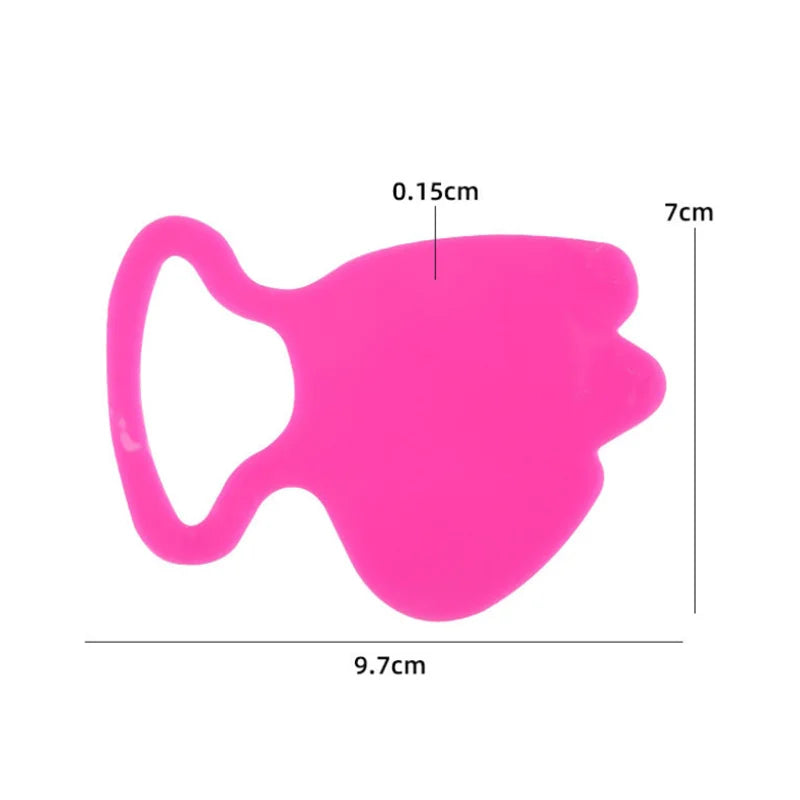 Bright pink, fish-shaped silicone anti-wrinkle patch with measurement labels indicating 9.7cm length and 7cm height.