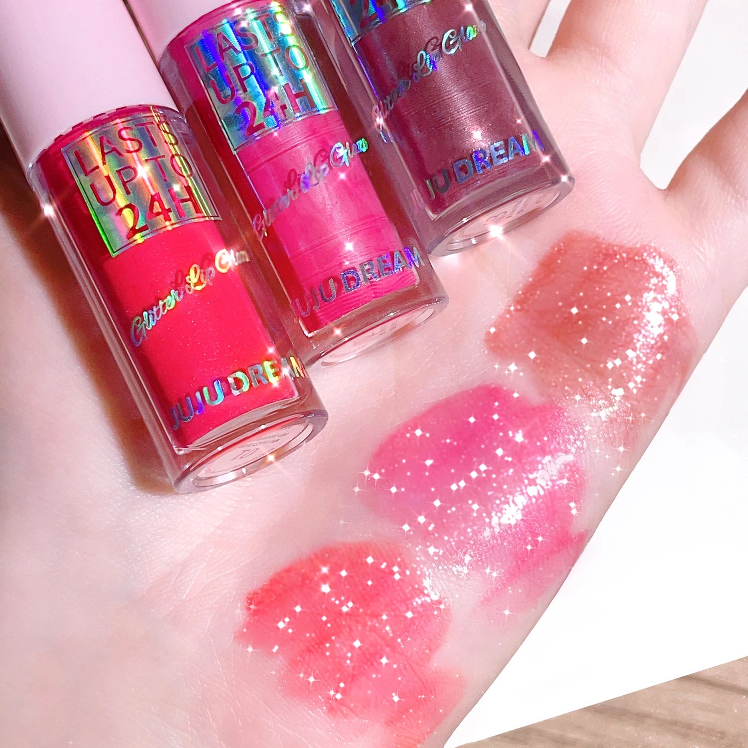 Long-lasting glitter lip gloss swatches in vibrant pink, red, and nude shades with a waterproof, high-shine finish.