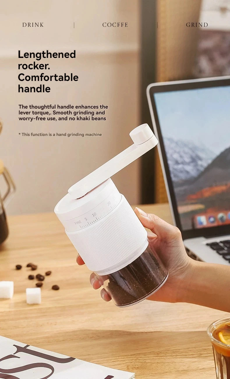 Handheld manual coffee grinder, compact white plastic design with long ergonomic handle and clear grounds container.