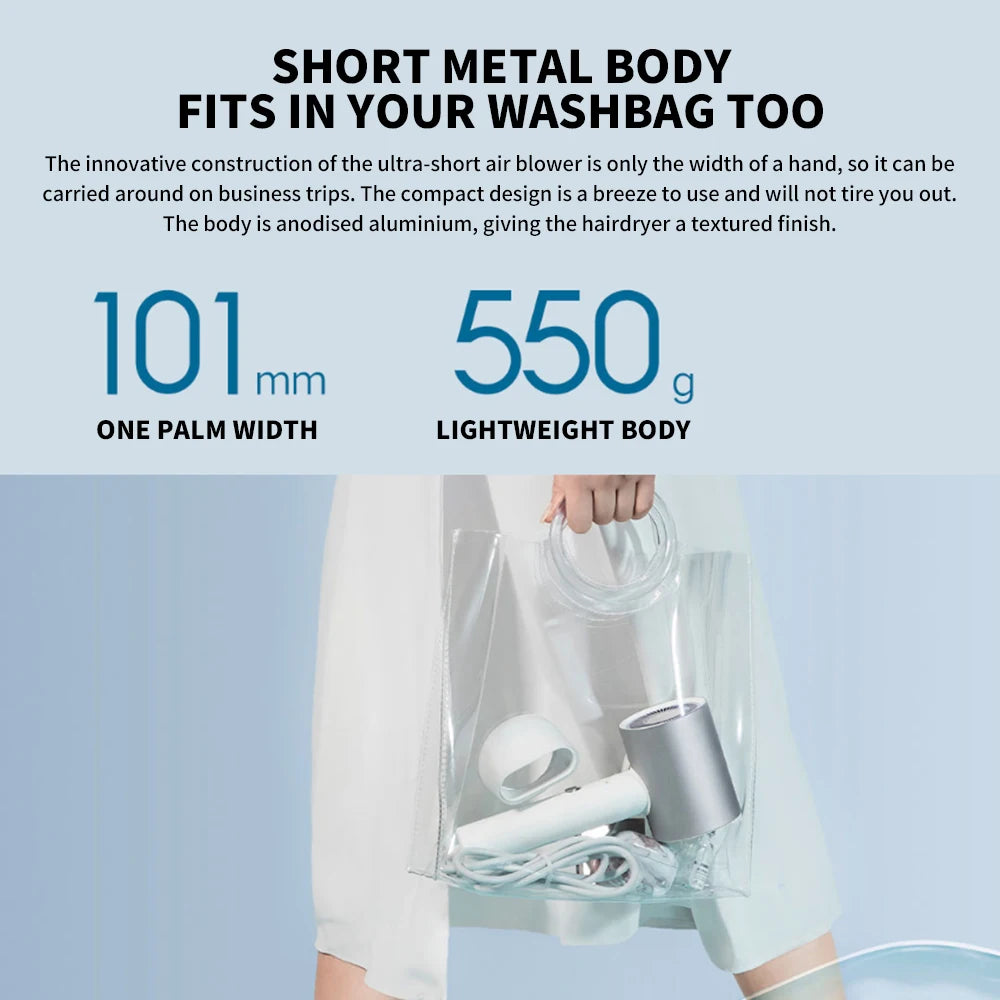 Compact silver MIJIA H500 water ion hair dryer with nozzle attachment inside a travel bag for portable styling.