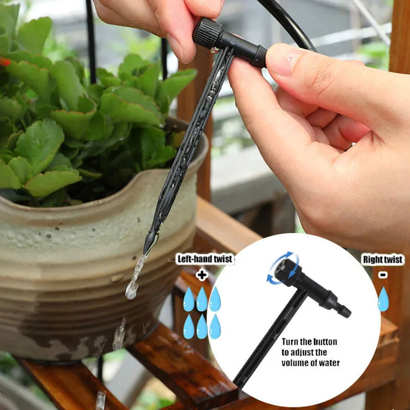 Adjustable drip irrigation valve with black stake and water outlet for potted plants