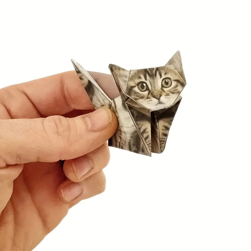 Handheld tabby cat origami paper craft, a perfect DIY gift and cute home decor for cat lovers.