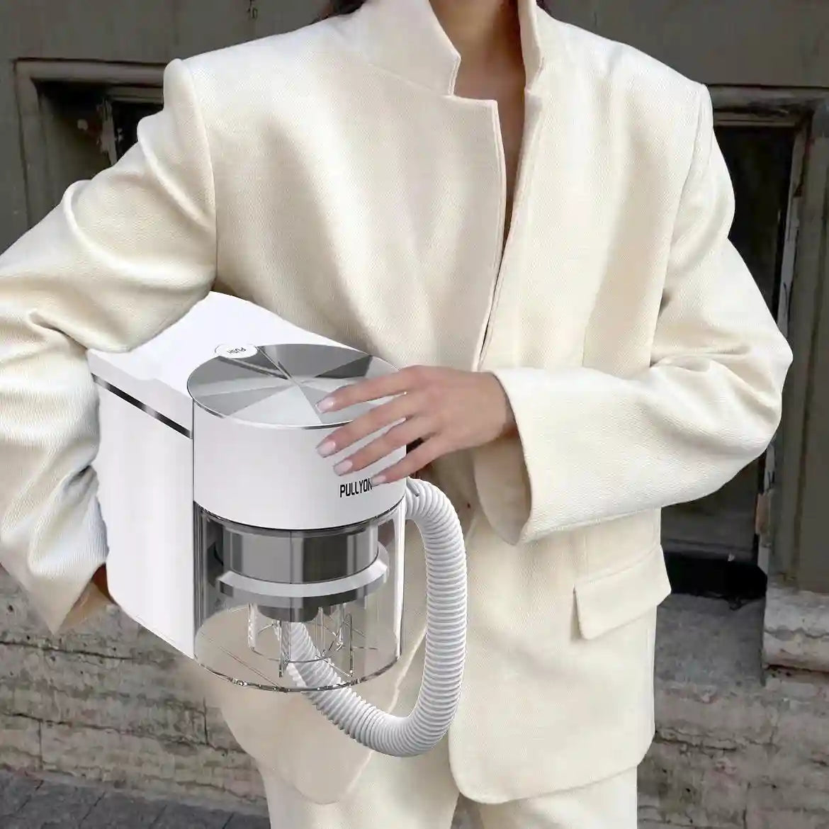 Portable white mini nail art vacuum cleaner with strong suction, built-in filter, and flexible hose for home salons.