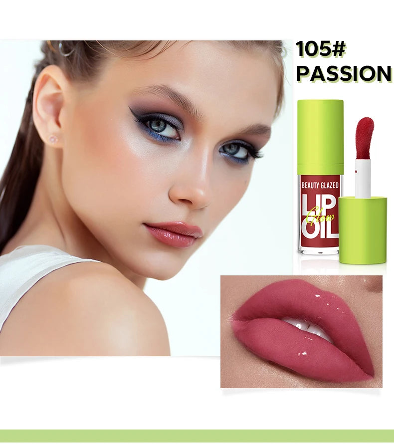 Beauty Glazed Passion lip oil with a shiny, pearlescent nude-pink stain finish for hydrated, mirror-gloss lips.