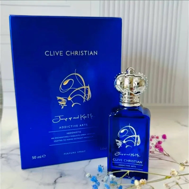 Clive Christian Jump Up and Kiss Me 50ml women's perfume. Elegant crown-cap blue bottle. Amber, floral, woody scent.