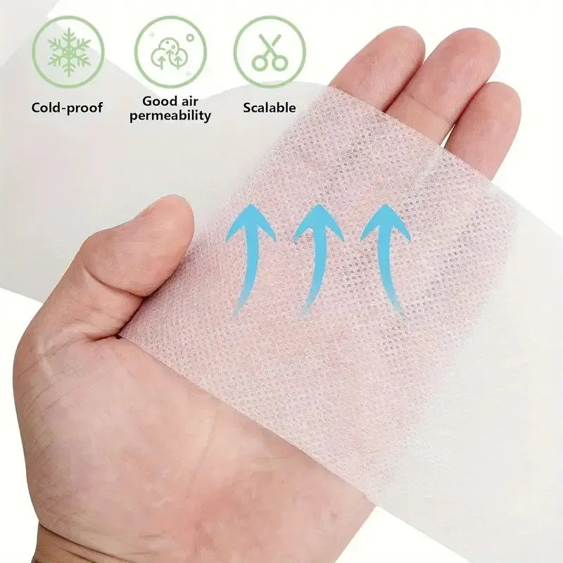 Translucent frost protection film strip held in hand with breathable texture