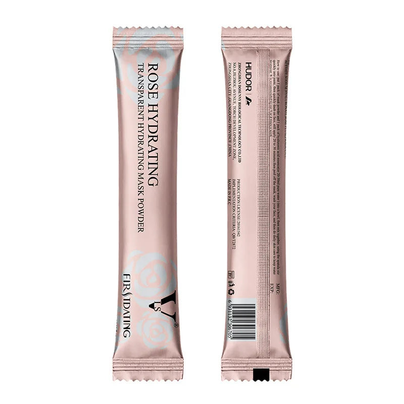 Front and back view of a rose hydrating mask powder packet in a slim, metallic pink sachet with rose pattern.