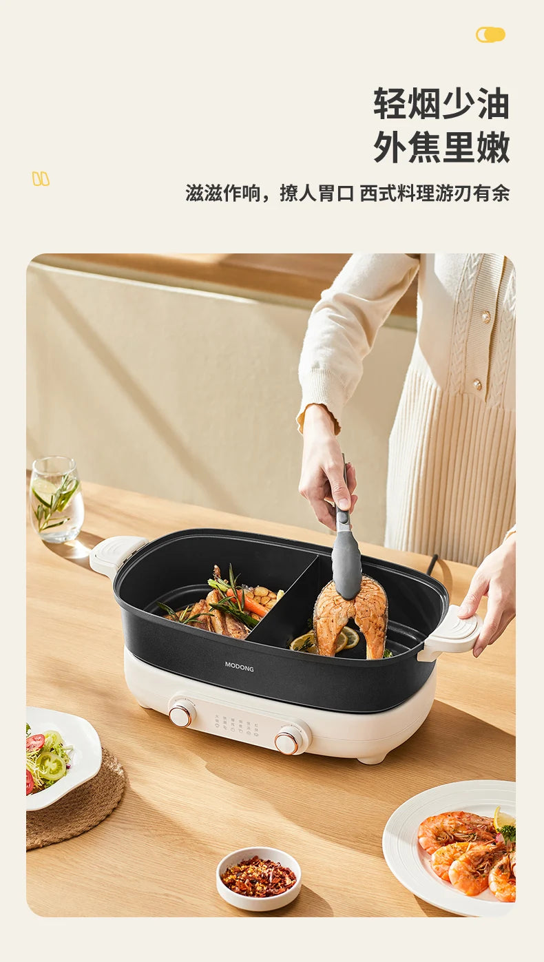 White electric hot pot with black bowl, person lifting cooked food from inside