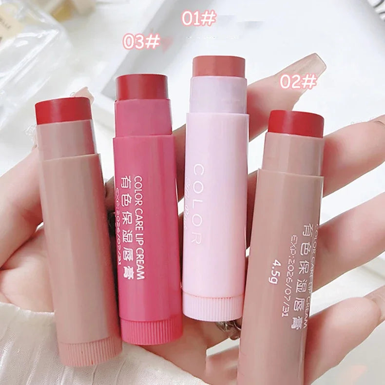 Set of colorful moisturizing tinted lip balms in tubes, designed for anti-drying and reducing lip lines.