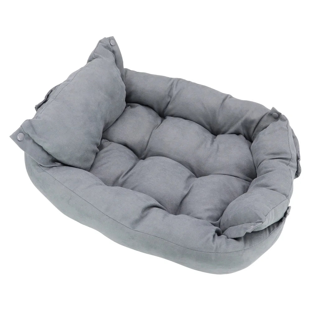 Plush grey sofa bed for dogs and cats, providing cozy, cushioned support for warm winter sleeping.