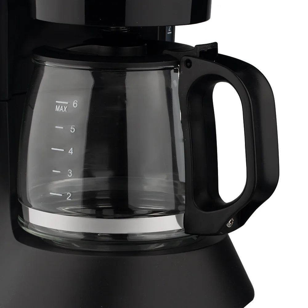 Black coffee maker with 6-cup glass carafe featuring measurement markings and a plastic handle.