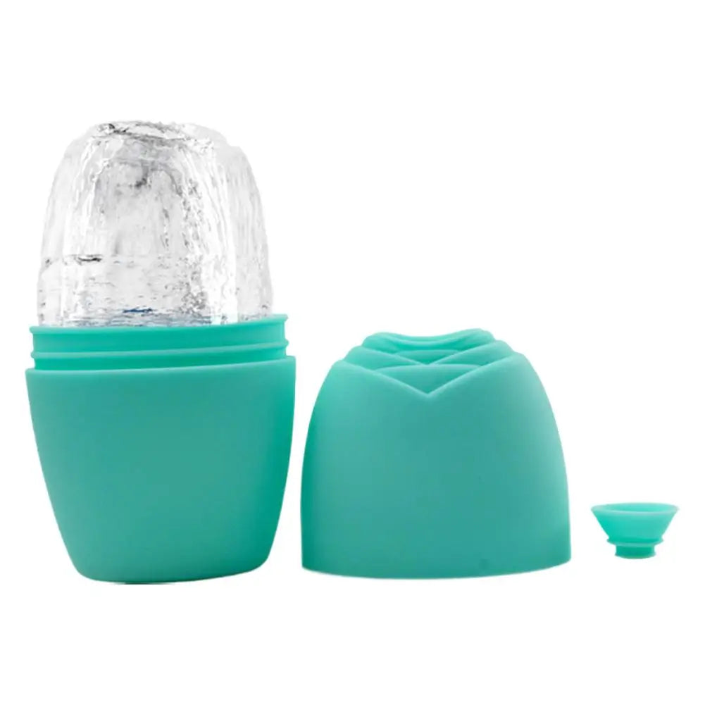 Teal silicone face ice roller mold with exposed ice core, rose-shaped cap, and small plug for skincare massage.