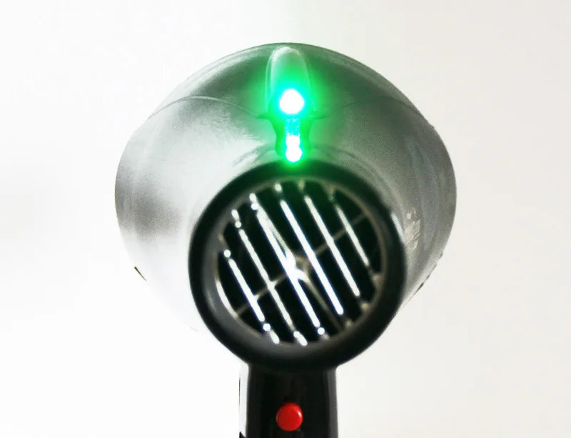 Professional 2100W hair dryer in black with green LED power indicator, featuring a salon-grade concentrated nozzle.