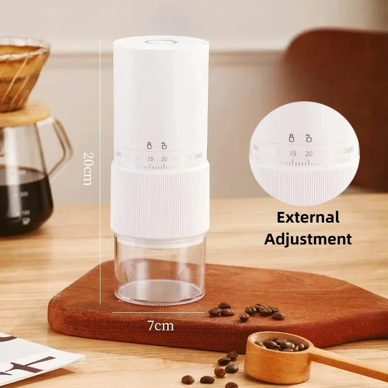 White portable electric coffee grinder, 20cm tall, with external grind adjustment and clear base for coffee beans.