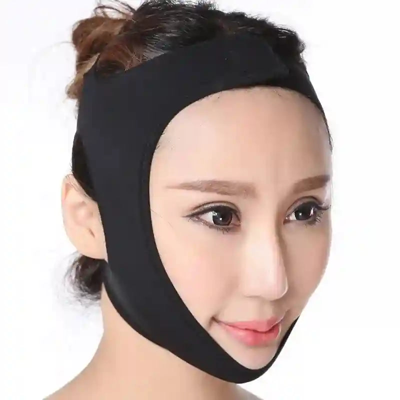 Woman wearing a black elastic V-line face slimming bandage strap that lifts the chin and cheeks.
