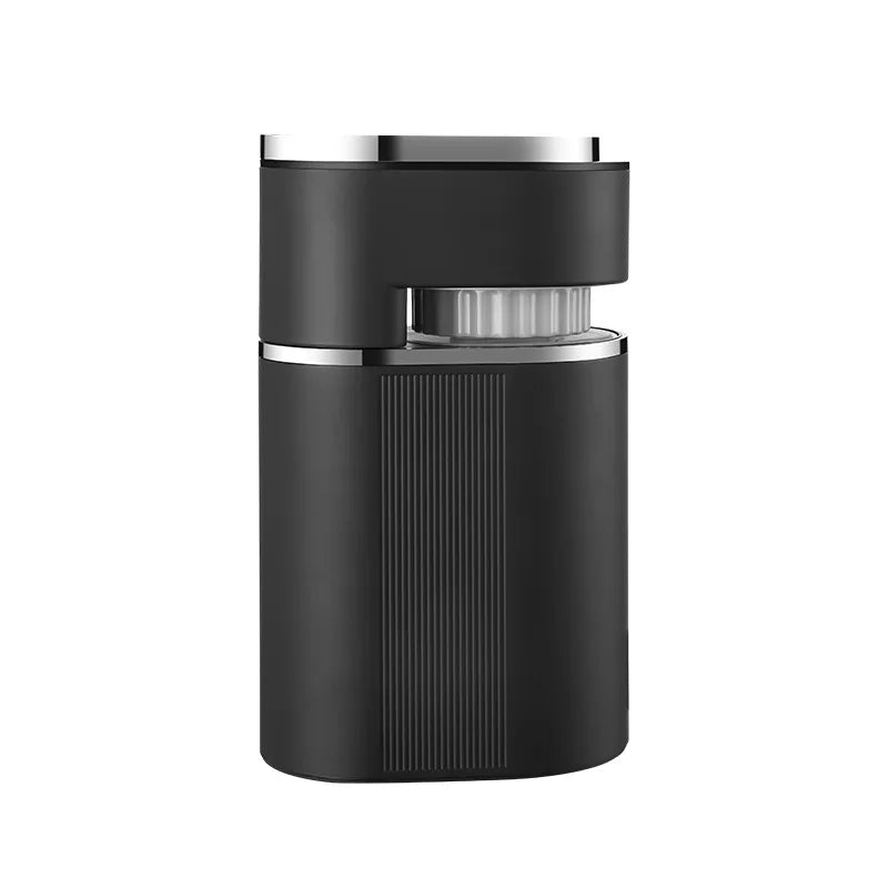Matte black portable coffee bean grinder with silver accents and compact ribbed body design.