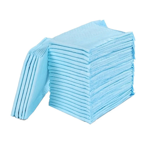 Stack of blue disposable baby changing pads for infant care and diaper changes.