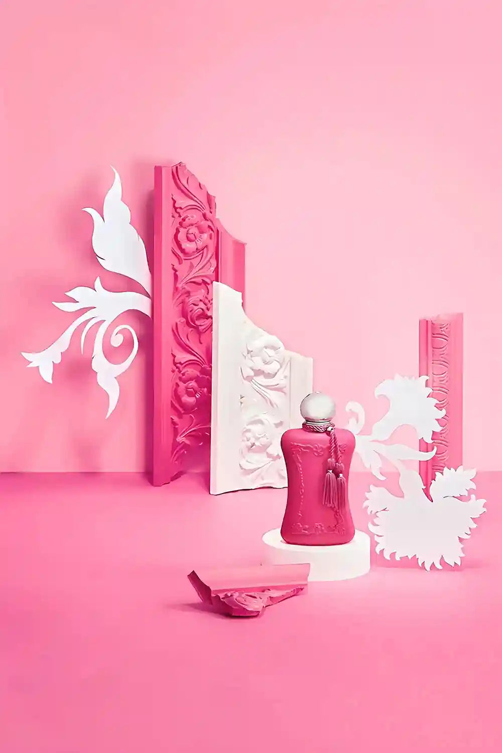 Parfums de Marly Delina Eau de Parfum, 75ml luxury floral women's perfume in a pink tasseled bottle with ornate décor.