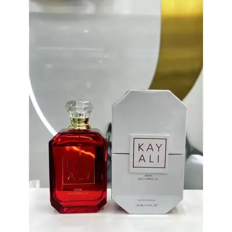 Kayali Eden Juicy Apple | 01 EDP 100ml: A luxury fruity floral perfume in a red rectangular bottle with diamond cap.