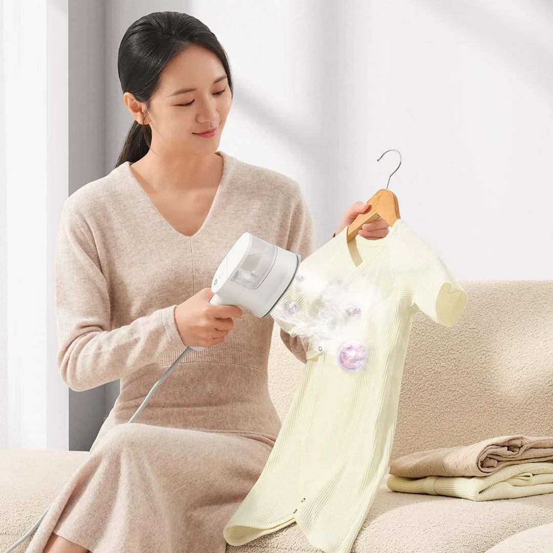 Tidesmit MIJIA handheld garment steamer showing steam nozzle and water tank for flat and hanging clothes ironing