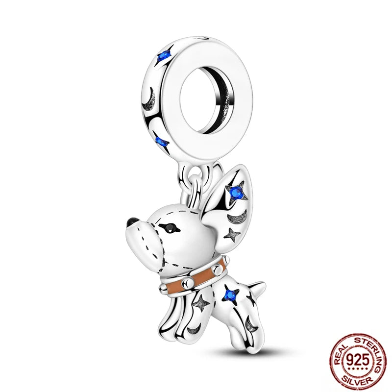 925 sterling silver puppy dog charm with blue crystal accents for DIY charm bracelets and pet lover jewelry.