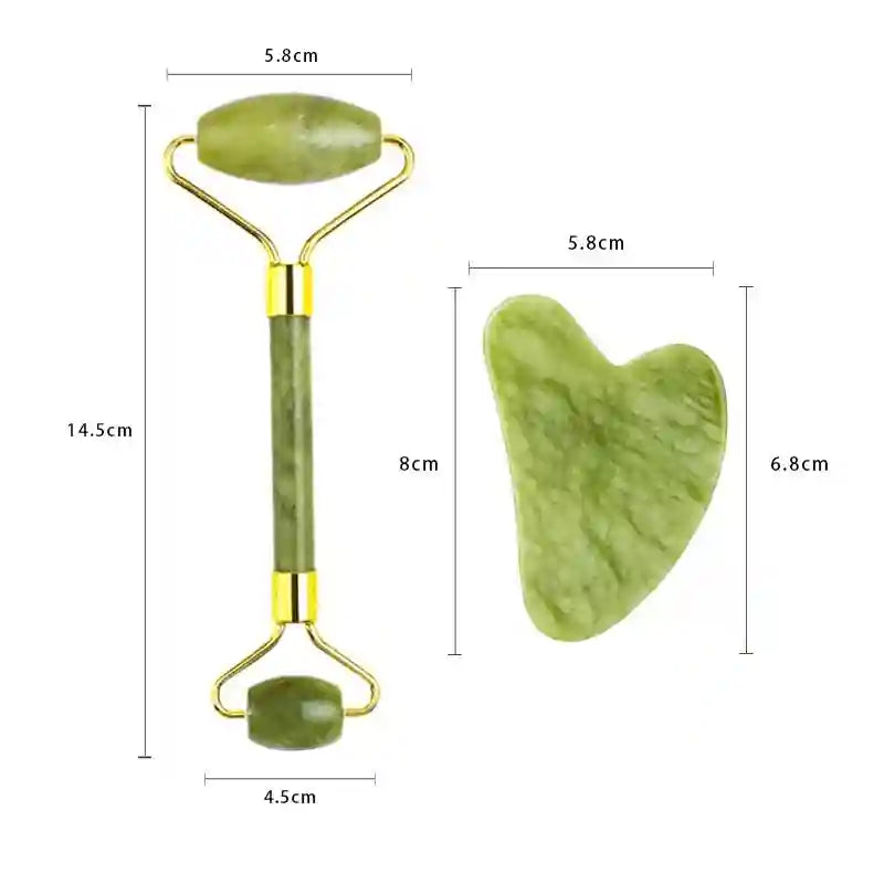 Green jade facial roller and heart-shaped gua sha scraping tool with gold metal accents and dimension measurements.