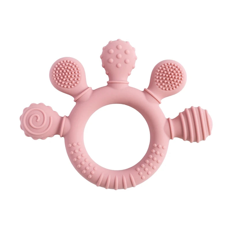 Pink silicone baby teething ring toy for infant gum relief.