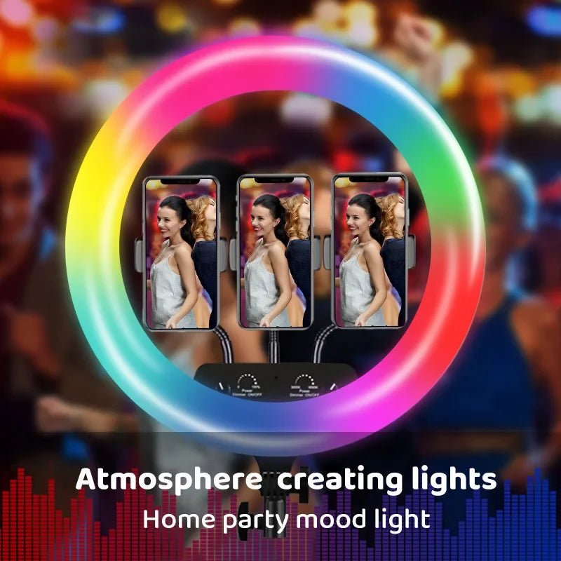 RGB LED ring light with three phone holders and adjustment knobs, used for content creation and ambient lighting.