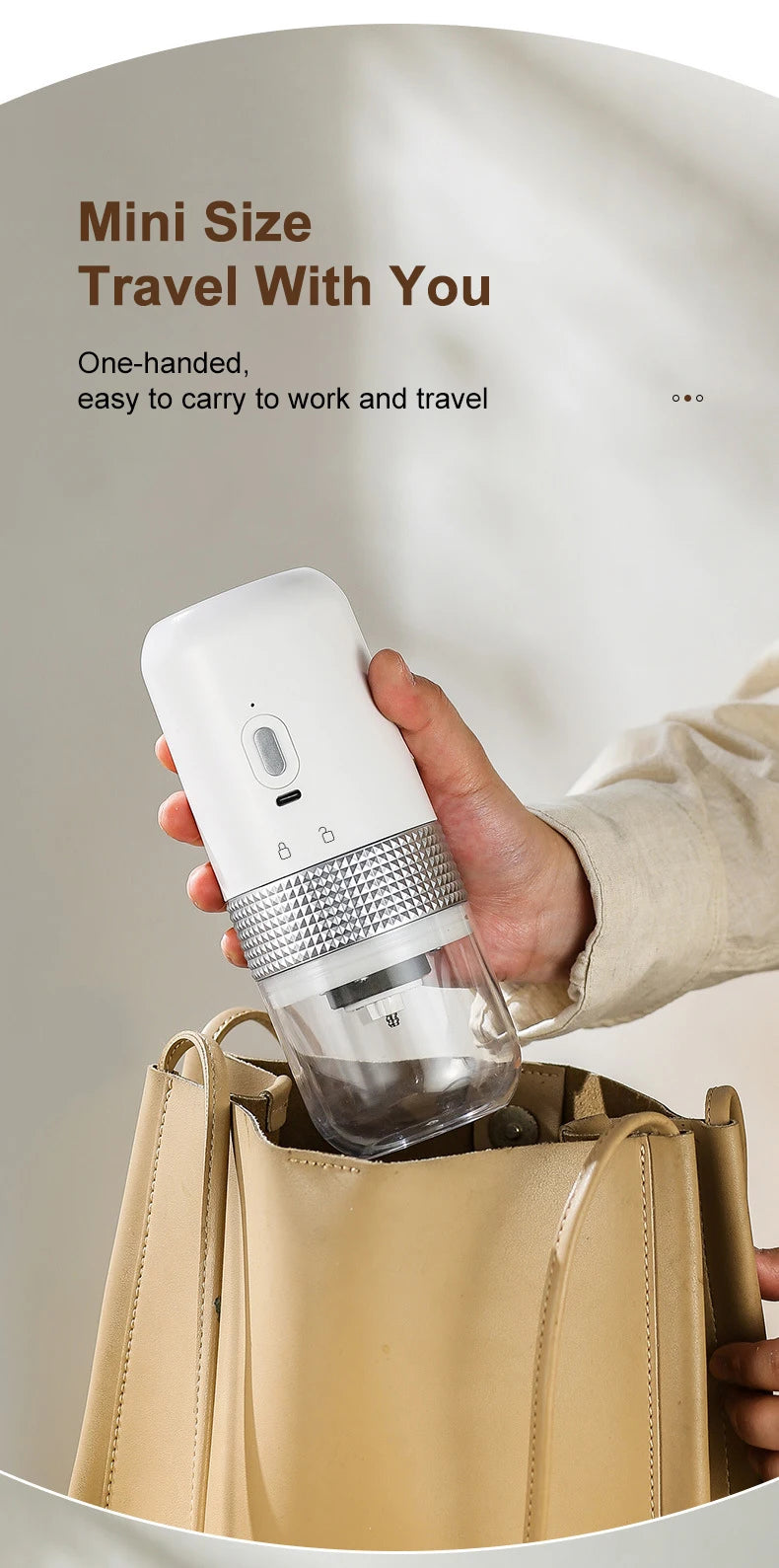 Portable white mini electric coffee maker with a textured silver band, held over a handbag for travel.