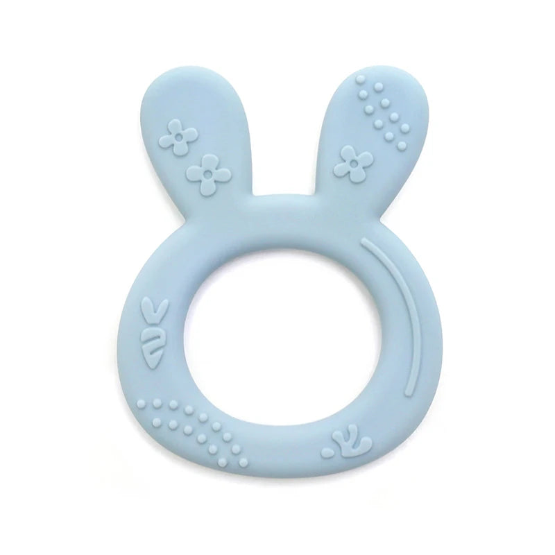 Light blue silicone bunny teething ring for baby teething relief.