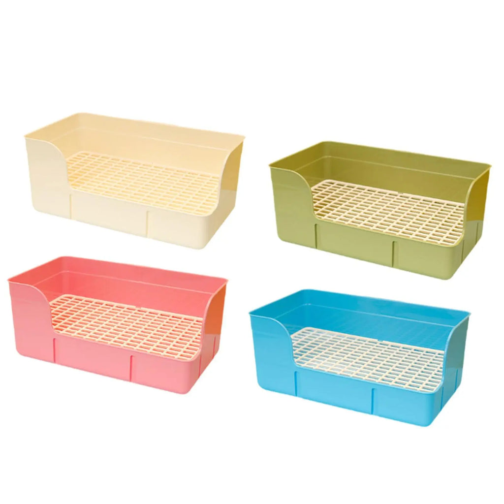 Set of 4 colorful plastic litter boxes for rabbits, hamsters, and small pets with easy-clean mesh grid trays.