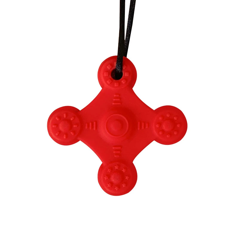 Red silicone teething toy for baby relief on a black necklace cord.