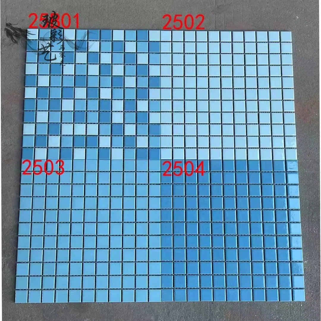 Ceramic mosaic tile sheet with small square light blue tiles in a grid pattern