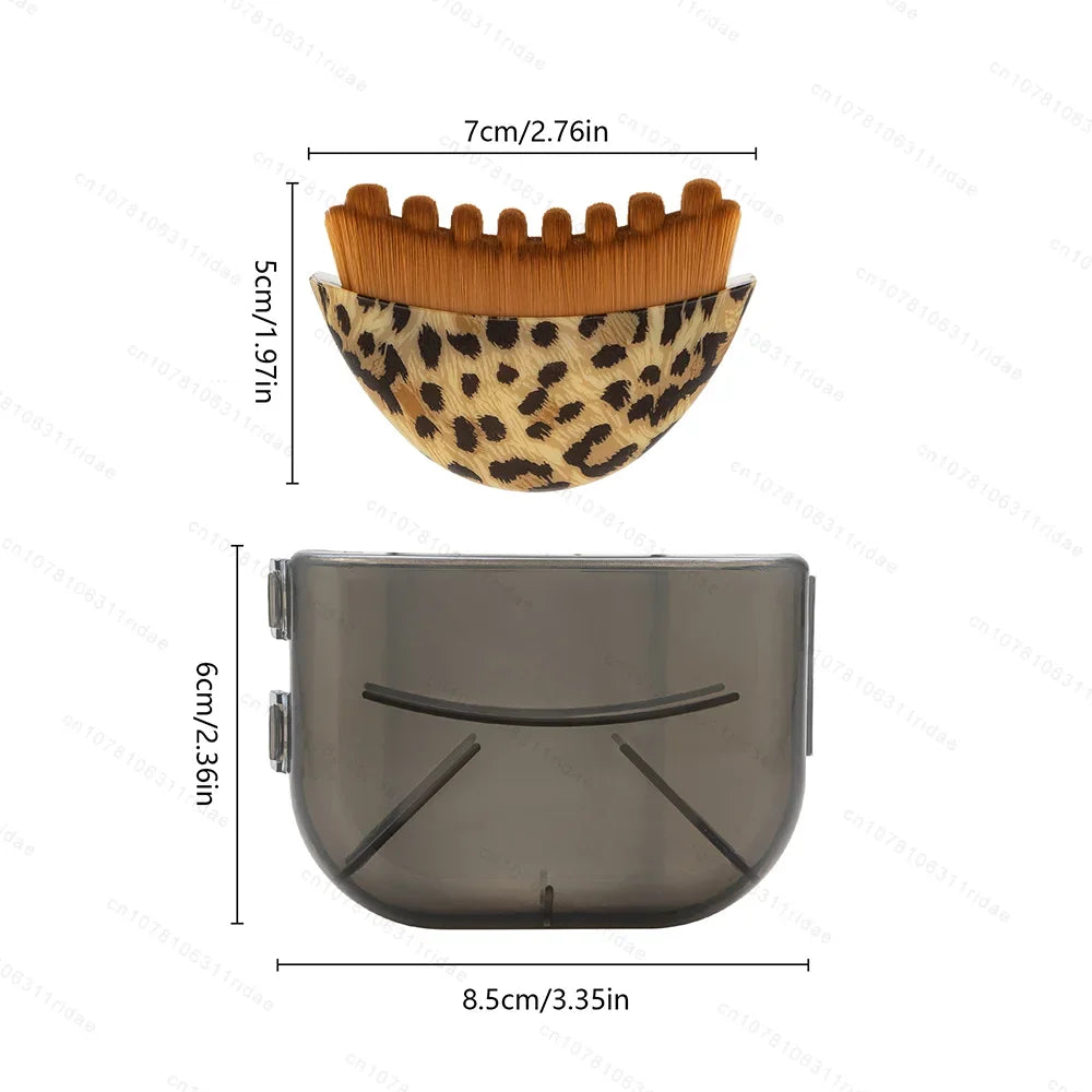 A leopard-print, semicircular facial brush with brown bristles, shown with its translucent grey storage case and sizes.